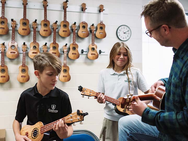 Gateway Christian Academy - Va Beach Gateway - Music teacher playing instruments with students | Gateway Christian Academy, Virginia Beach, VA 23462